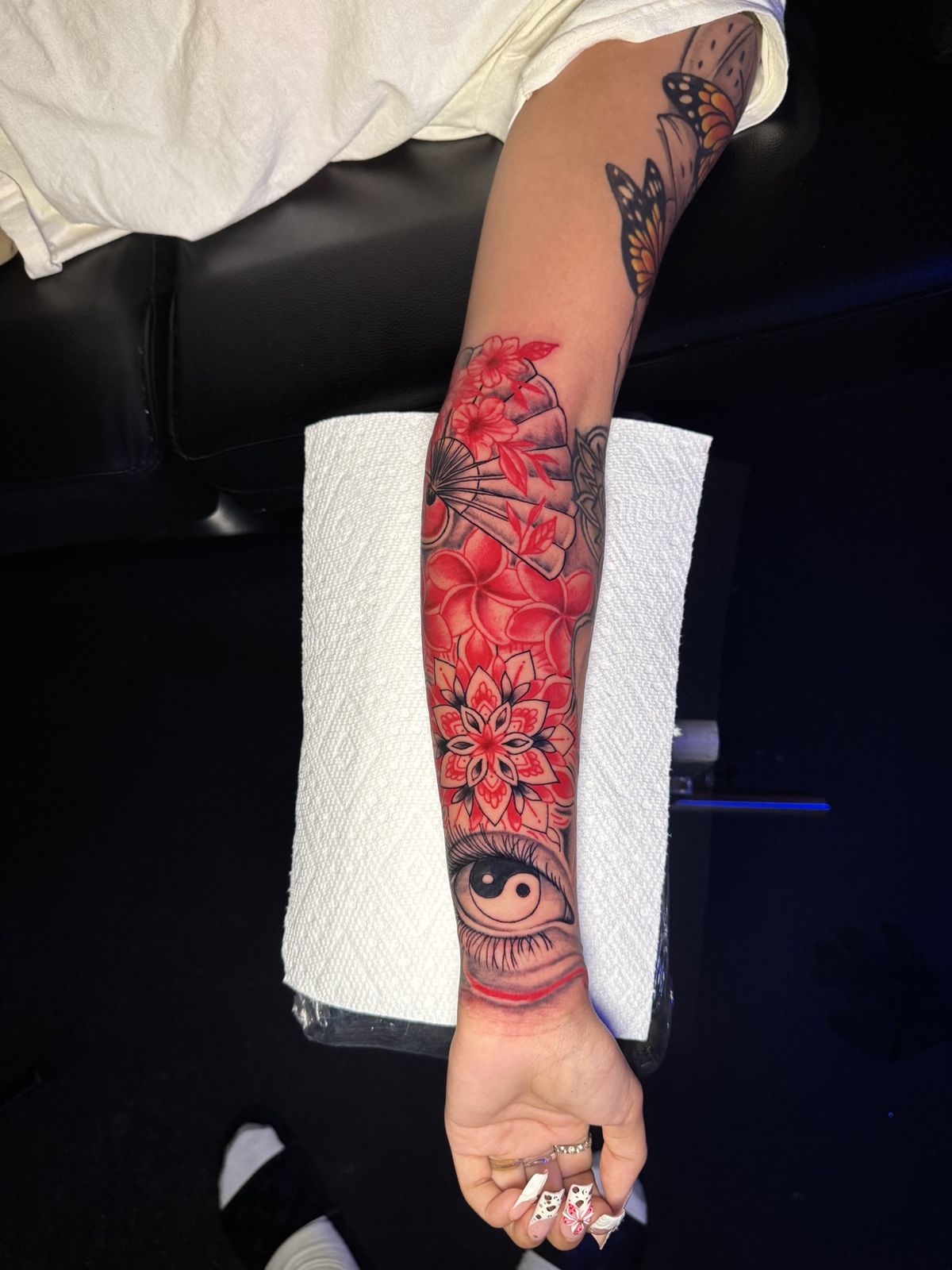 Red floral forearm sleeve with fan, mandala and yin-yang eye