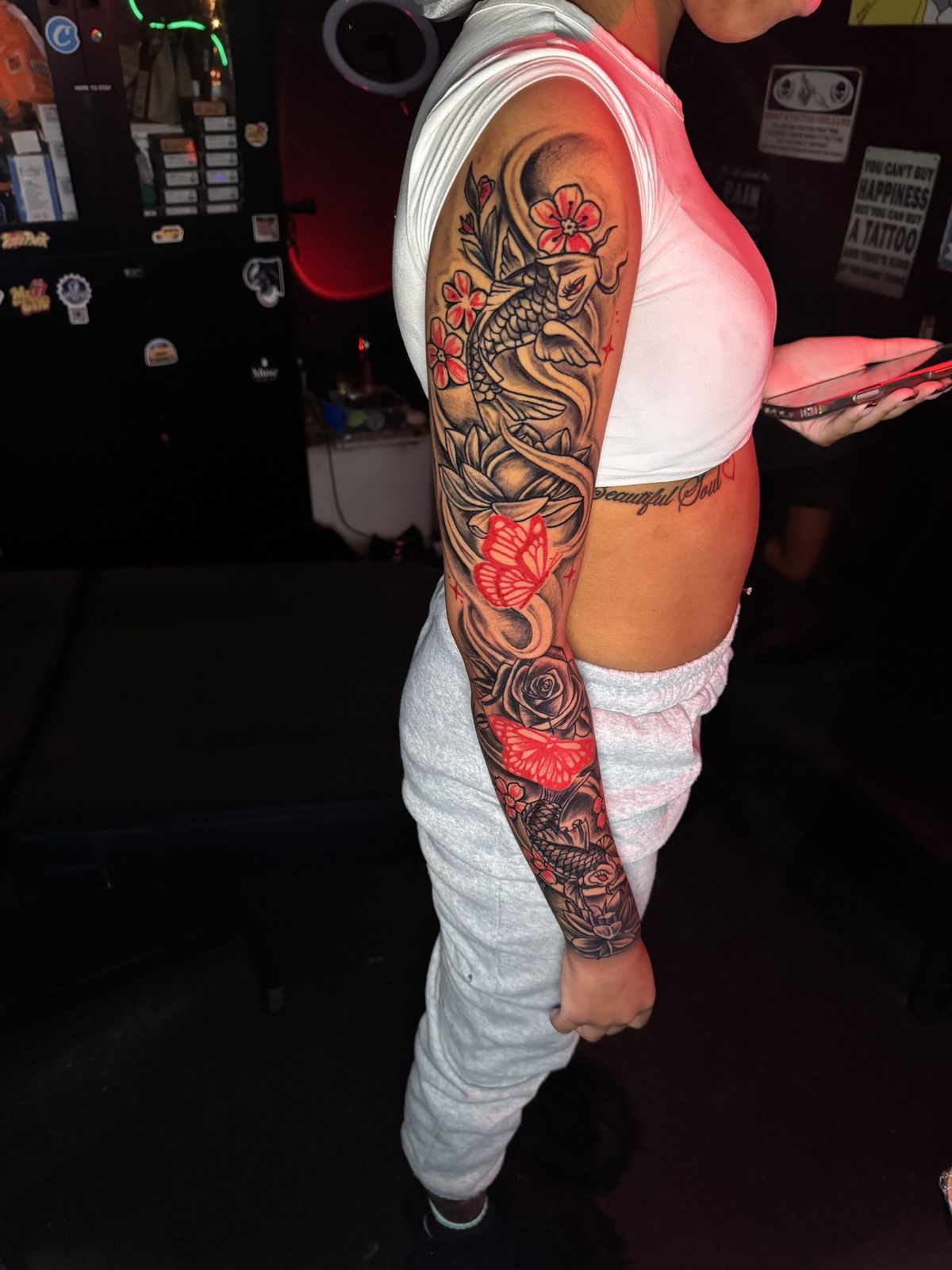 Koi and butterfly full sleeve with red accent flowers